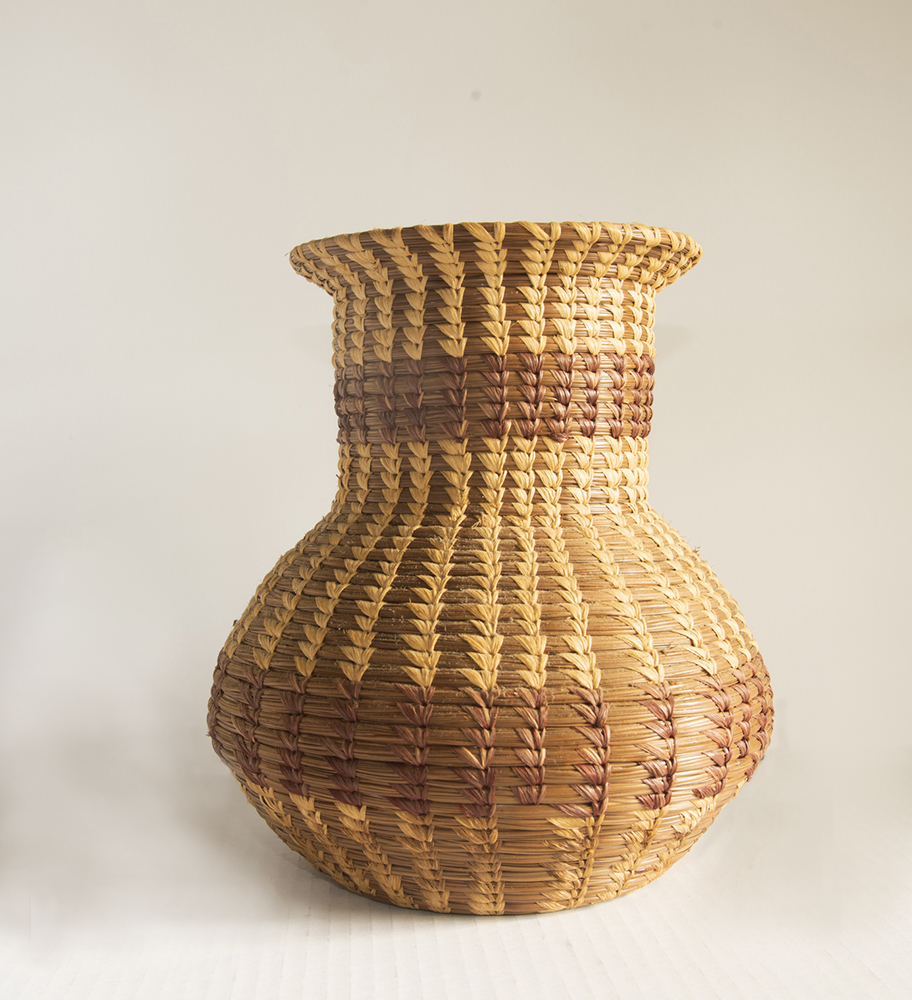 A basket made of pine needles by a Native American craftsman